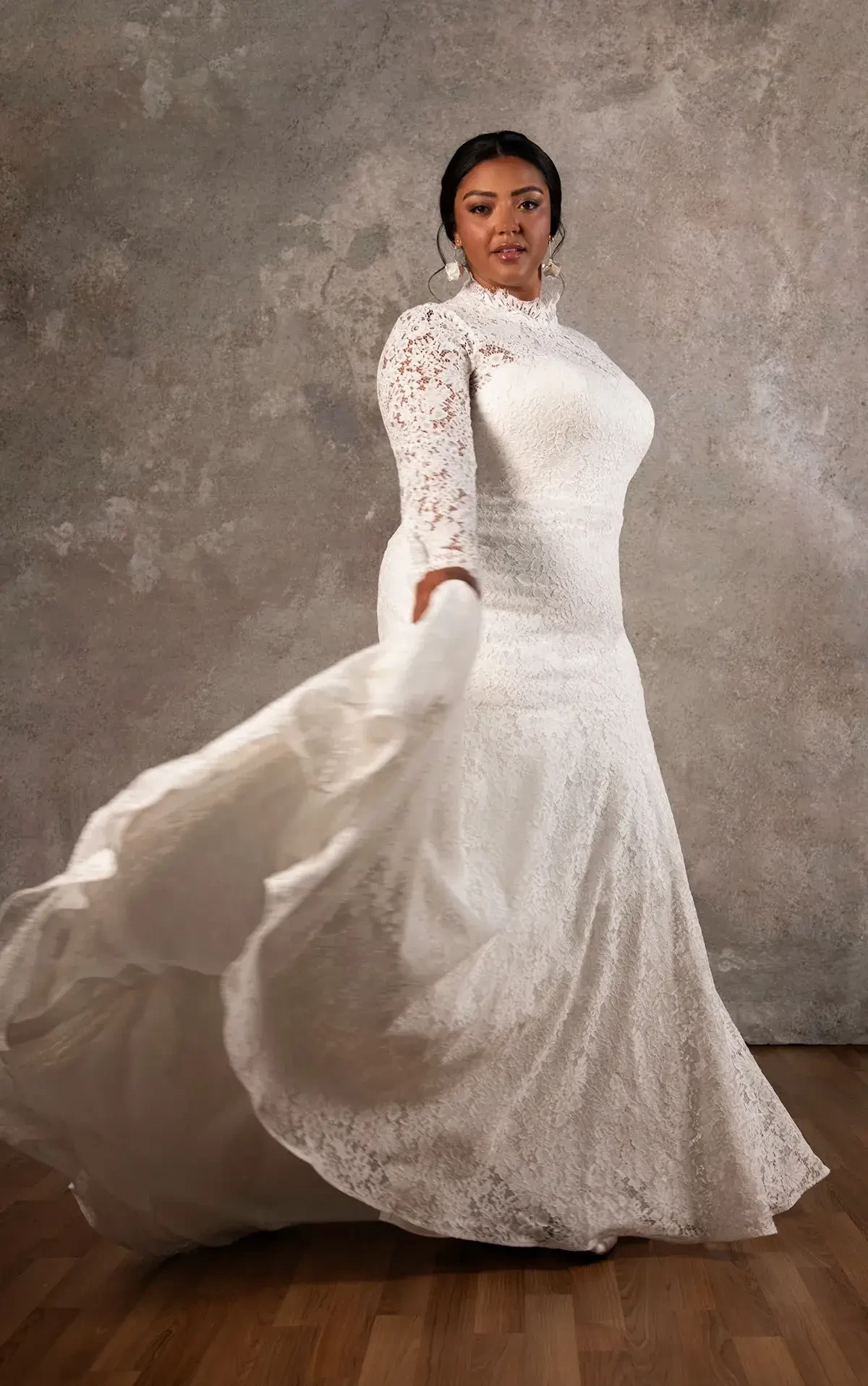 Fall Wedding Elegance: Gowns with Sleeves and Rich Textures Image