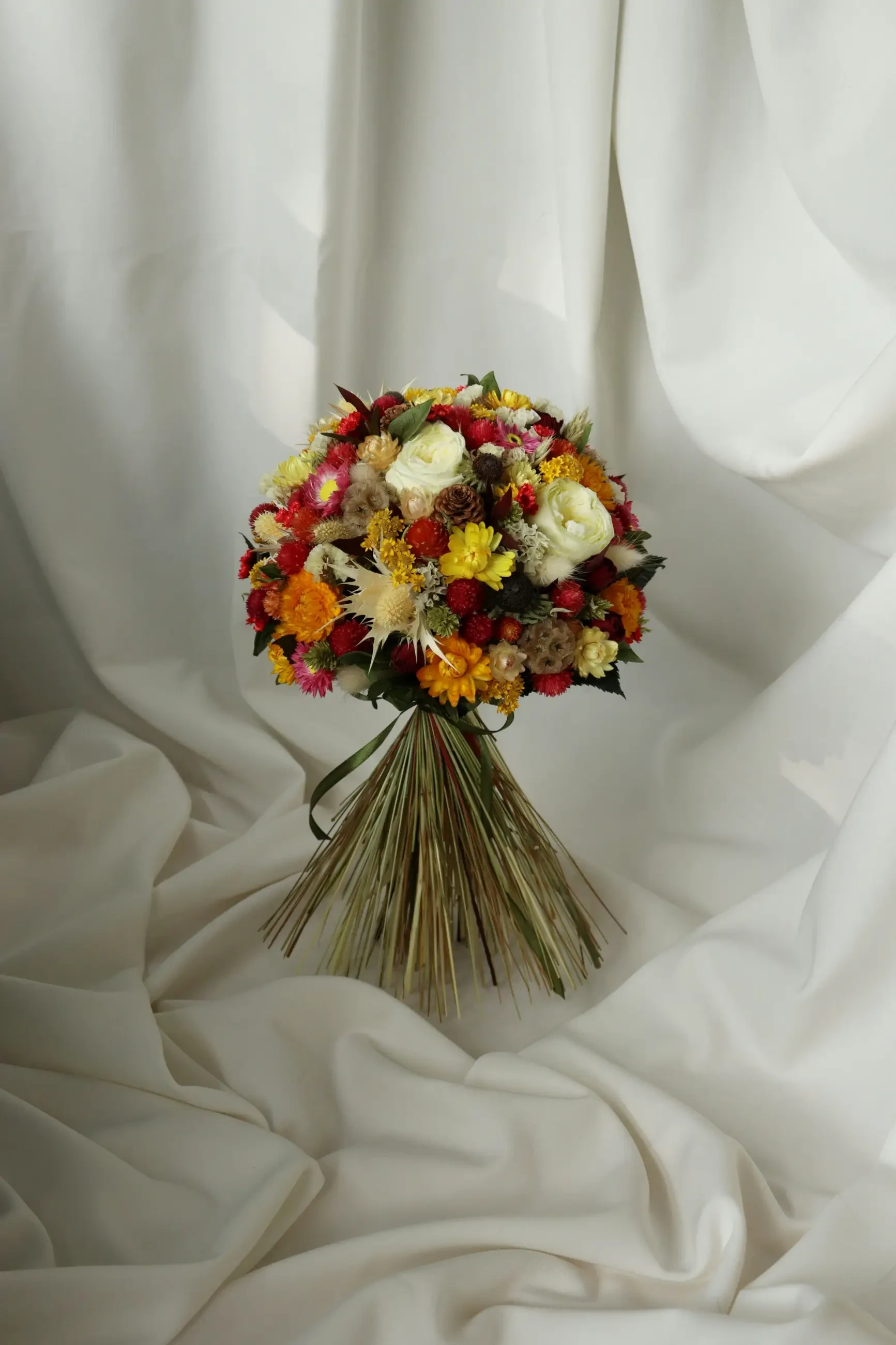 image is a bouquet of fall flowers for a wedding